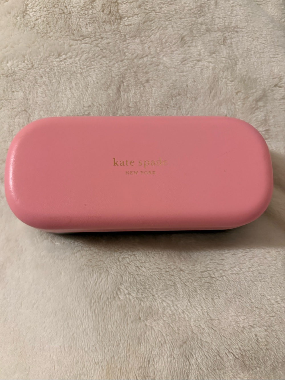 kate spade cream eyewear case with gold lettering